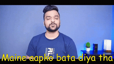 Man in Blue Shirt with Maine Aapko Bata Diya Tha