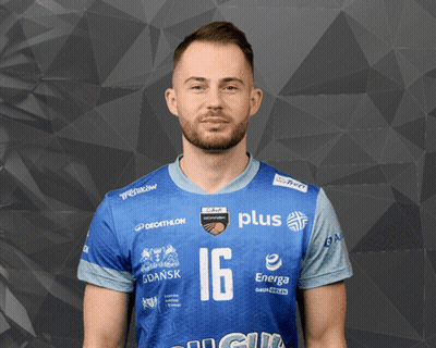 Man in Blue Shirt With Number 16