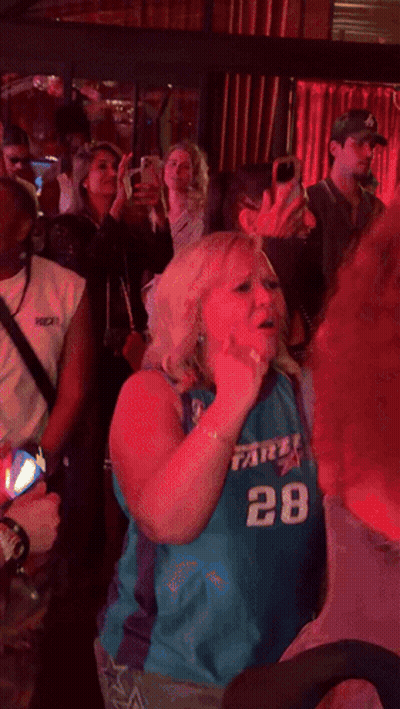 Man In Blue Shirt With S Dancing In Crowd GIF