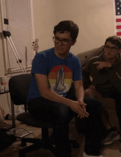 Man In Blue Shirt With Space Shuttle GIF
