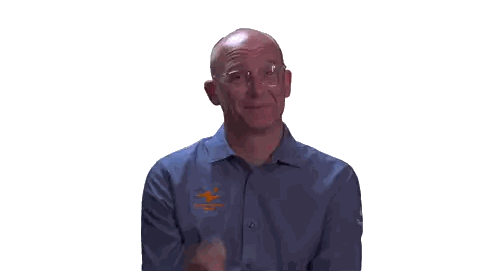 Man In Blue Shirt With Sticker