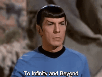 Man in Blue Shirt with To Infinity and Beyond