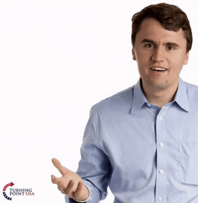 Man In Blue Shirt With Turning Point USA Logo GIF