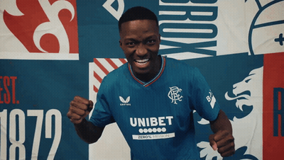 Man In Blue Shirt With Unibet On Sleeve GIF