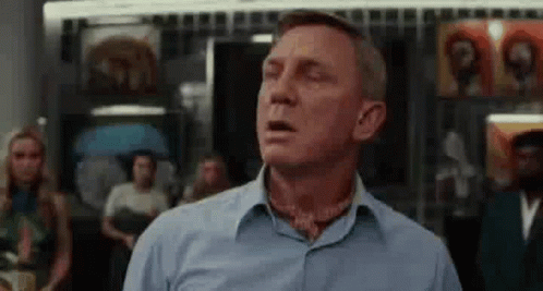Man In Blue Shirt Yawning GIF