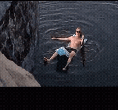 Man In Blue Shorts Giving Thumbs Up GIF