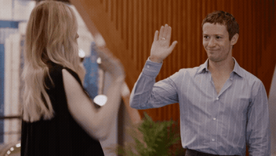 Man In Blue Striped Shirt Waving At Woman In Black Dress GIF