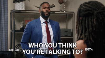 Man In Blue Suit And Red Tie Talking To Woman GIF