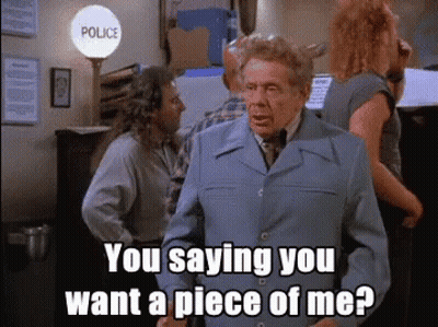 Man In Blue Suit And Tie Standing In Front Of Police Sign GIF