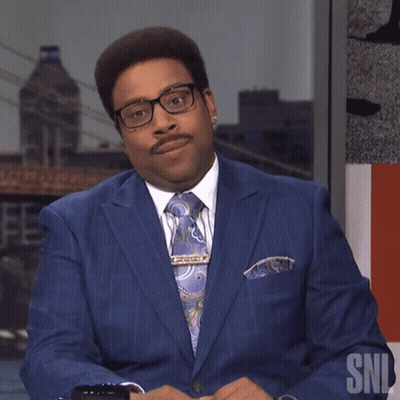 Man In Blue Suit And Tie With SNL GIF