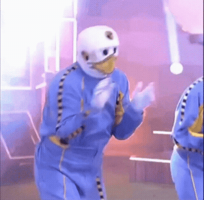 Man In Blue Suit And White Helmet Dancing GIF