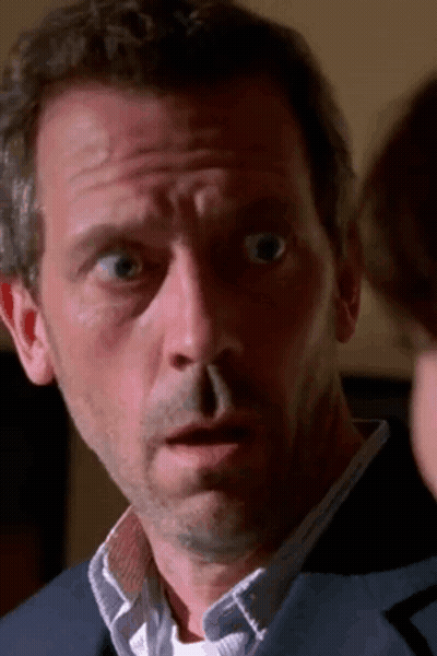 Man In Blue Suit And White Shirt Surprised GIF