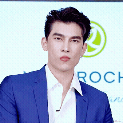 Man In Blue Suit And White Shirt With Roch Sign GIF