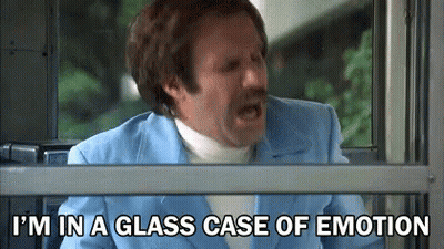 Man In Blue Suit And White Turtleneck Screaming By Window GIF