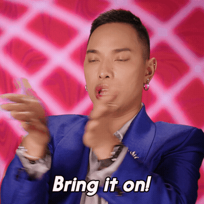 Man In Blue Suit Clapping Saying Bring It On GIF