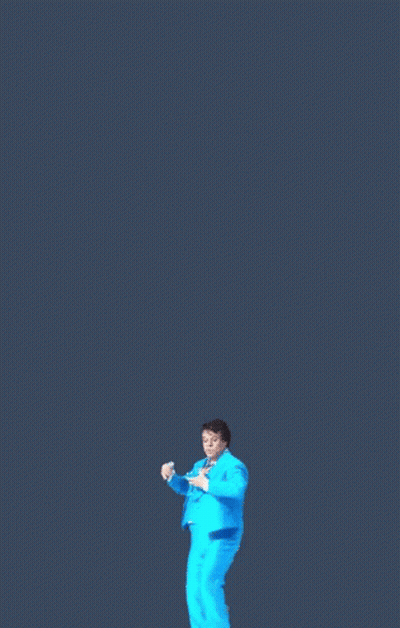 Man In Blue Suit Dancing Against Dark Blue Background GIF
