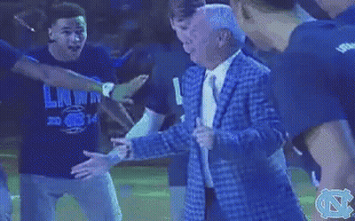 Man In Blue Suit Dancing On Stage With N GIF