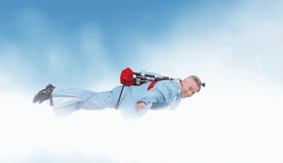 Man In Blue Suit Flying With Red Bag GIF