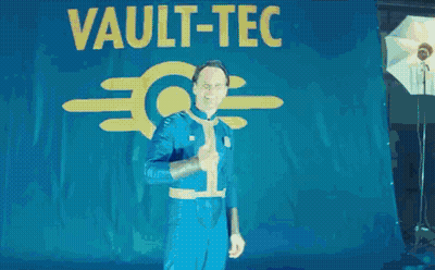 Man In Blue Suit Giving Thumbs Up Saying Vault Lc GIF