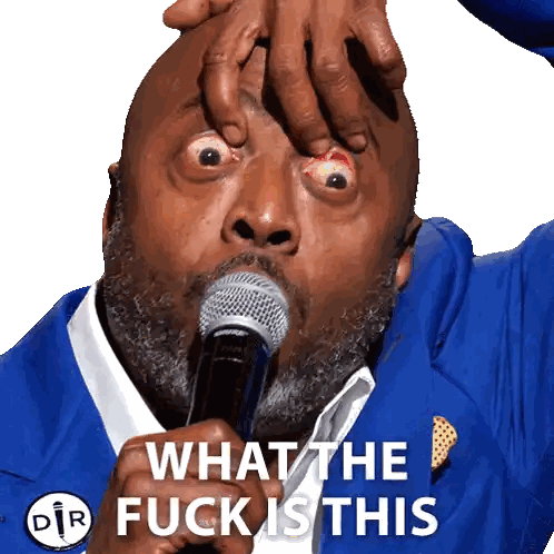 Man In Blue Suit Holding Microphone Saying What The Fuck Is This Sticker