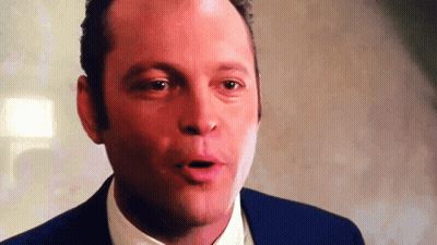 Man In Blue Suit Making Funny Face GIF