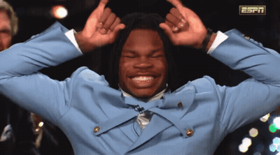 Man In Blue Suit Making Funny Face With ESPN Logo GIF