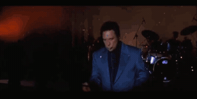 Man In Blue Suit Playing Saxophone In Front Of DW Drum Set GIF