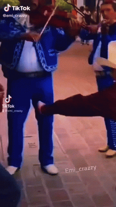 Man In Blue Suit Playing Violin GIF