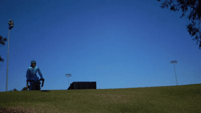 Man In Blue Suit Riding Motorcycle Dumb And Dumber GIF