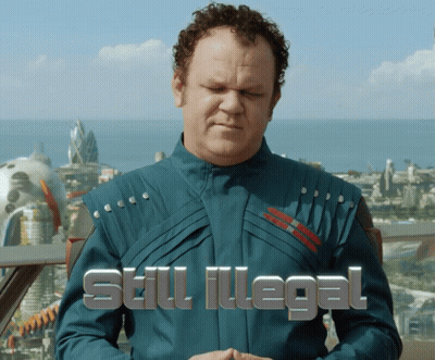 Man In Blue Suit Saying Still Illegal GIF