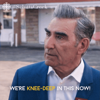Man In Blue Suit Saying We're Knee Deep In This Now GIF