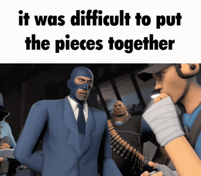 Man In Blue Suit Talking To Man In Mask GIF
