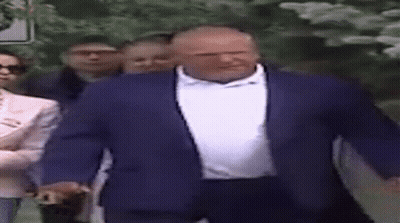 Man In Blue Suit White Shirt Walking With Group GIF