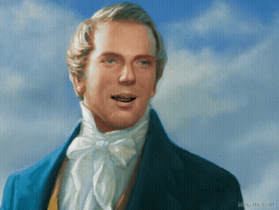 Man In Blue Suit With White Bow Tie GIF