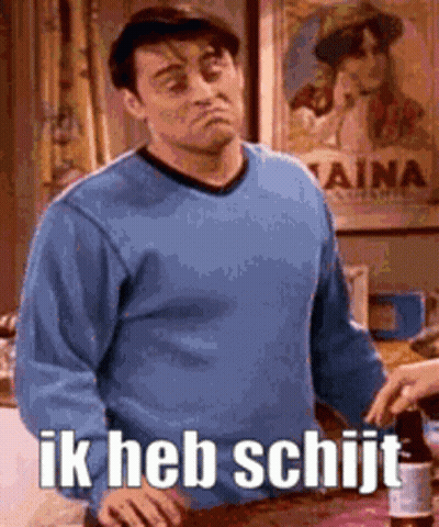 Man In Blue Sweater In Front Of Aina Poster GIF