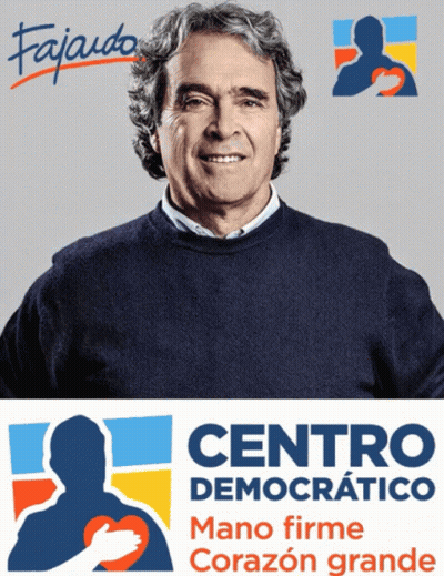 Man in Blue Sweater Next to Centro Democrático Logo