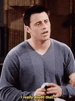 Man In Blue Sweater Saying I Doubt That GIF
