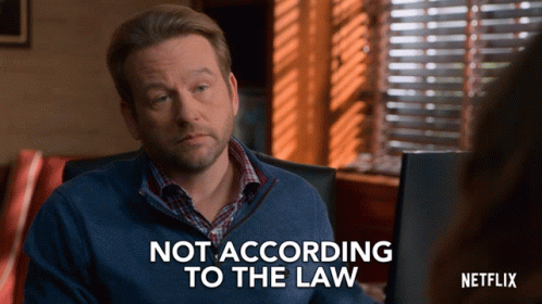 Man In Blue Sweater Saying Not According To Law GIF