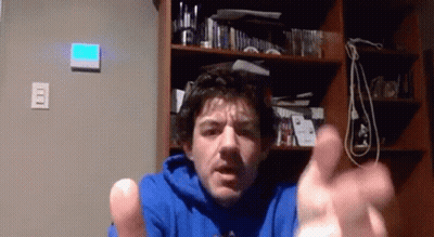Man In Blue Sweatshirt Making Funny Face GIF