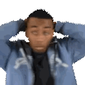 Man In Blue Sweatshirt With A Sticker
