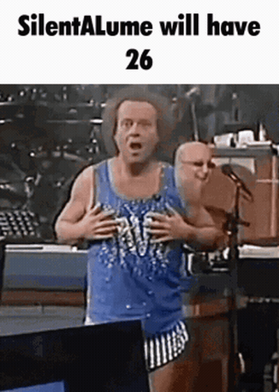 Man In Blue Tank Top At Microphone GIF