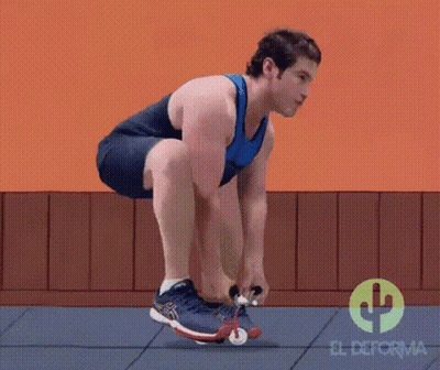 Man In Blue Tank Top Tying Shoelaces GIF
