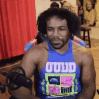 Man In Blue Tank Top With O'udd GIF