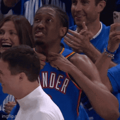 Man In Blue Thunder Jersey Surrounded By Fans GIF