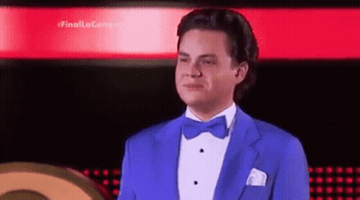Man In Blue Tuxedo And Bow Tie GIF