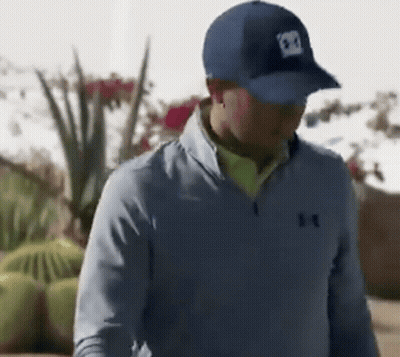 Man In Blue Under Armour Jacket And Hat GIF