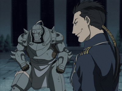 Man In Blue Uniform Standing Next To Robot GIF