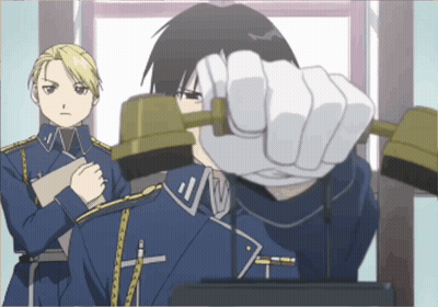 Man In Blue Uniform With Cross Collar Talking On Phone GIF