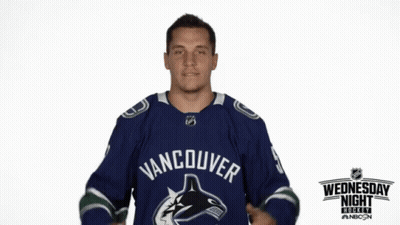Man In Blue Vancouver Jersey Pointing To Chest GIF