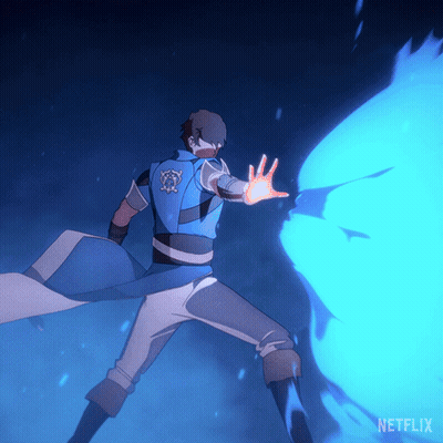 Man In Blue Vest In Front Of Netflix Background GIF